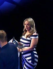 Mature prostitute is posing almost nude