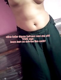 Thaiger wearing a tight skirt with a red top.