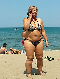 Shameless aged momma is taking off her clothes