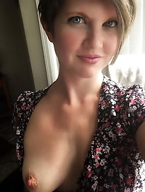 Older prostitute is touching herself