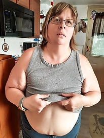 Brunette mature babysitter taking some naughty photos