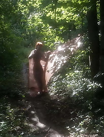 Old tart is posing undressed indoor