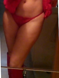 Elderly blonde woman has a young female servant