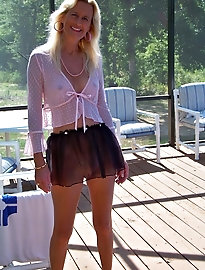 A voluptuous woman is engaging in sexual activity with her male partner